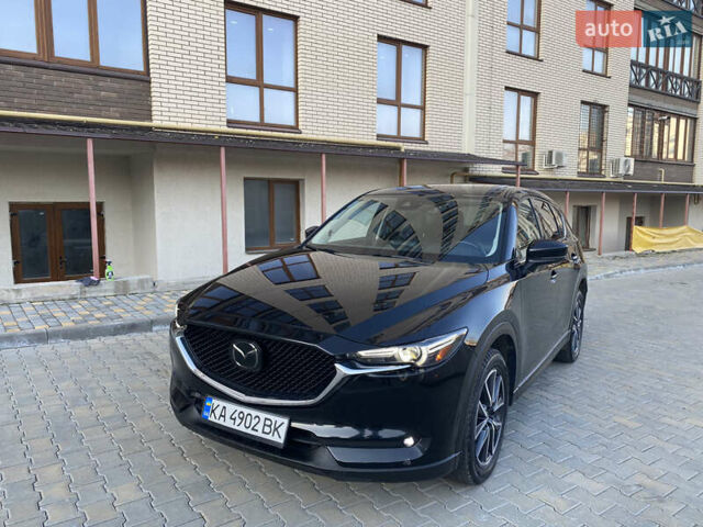 Черный Мазда СХ-5, объемом двигателя 2.5 л и пробегом 165 тыс. км за 18499 $, фото 1 на Automoto.ua