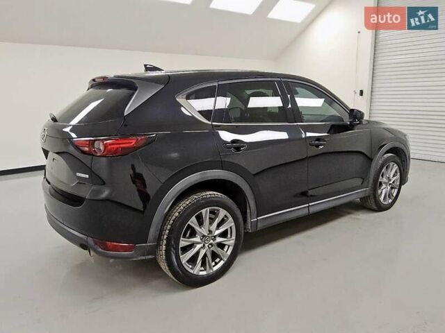 Черный Мазда СХ-5, объемом двигателя 2.49 л и пробегом 149 тыс. км за 5700 $, фото 2 на Automoto.ua