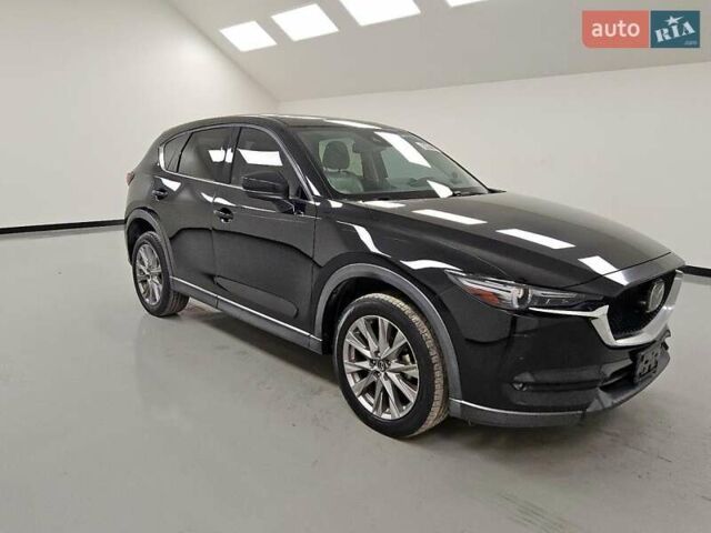 Черный Мазда СХ-5, объемом двигателя 2.49 л и пробегом 149 тыс. км за 5700 $, фото 3 на Automoto.ua