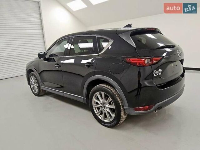Черный Мазда СХ-5, объемом двигателя 2.49 л и пробегом 149 тыс. км за 5700 $, фото 1 на Automoto.ua