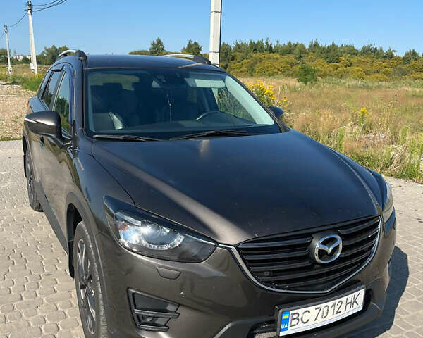 Коричневый Мазда СХ-5, объемом двигателя 2.19 л и пробегом 136 тыс. км за 19000 $, фото 2 на Automoto.ua