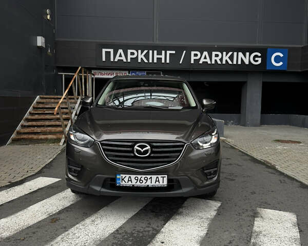 Коричневый Мазда СХ-5, объемом двигателя 2.5 л и пробегом 158 тыс. км за 17900 $, фото 1 на Automoto.ua