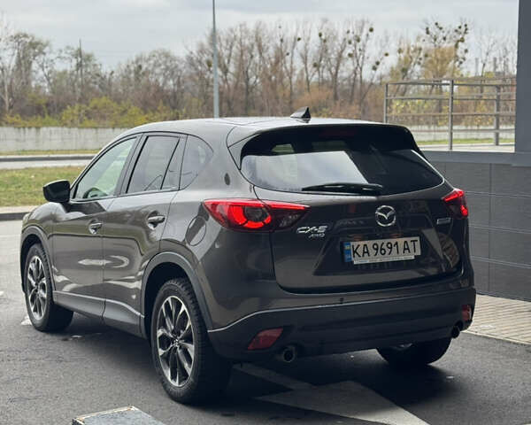 Коричневый Мазда СХ-5, объемом двигателя 2.5 л и пробегом 158 тыс. км за 17900 $, фото 4 на Automoto.ua