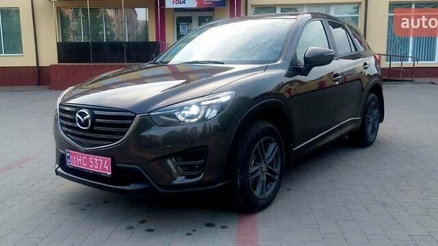 Коричневый Мазда СХ-5, объемом двигателя 2.2 л и пробегом 240 тыс. км за 15450 $, фото 1 на Automoto.ua