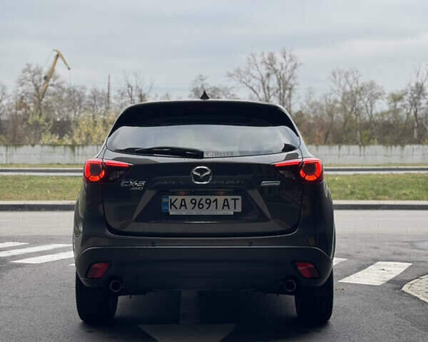 Коричневый Мазда СХ-5, объемом двигателя 2.5 л и пробегом 158 тыс. км за 17900 $, фото 6 на Automoto.ua