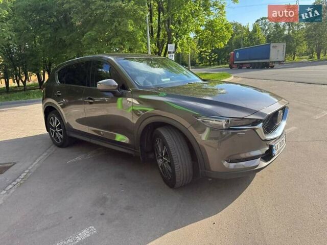 Коричневый Мазда СХ-5, объемом двигателя 2.19 л и пробегом 240 тыс. км за 19500 $, фото 1 на Automoto.ua