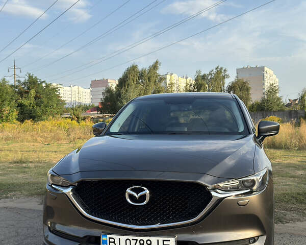 Коричневый Мазда СХ-5, объемом двигателя 2 л и пробегом 121 тыс. км за 21700 $, фото 3 на Automoto.ua