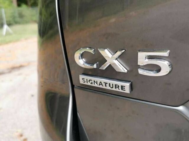 Коричневый Мазда СХ-5, объемом двигателя 2.5 л и пробегом 109 тыс. км за 14000 $, фото 9 на Automoto.ua