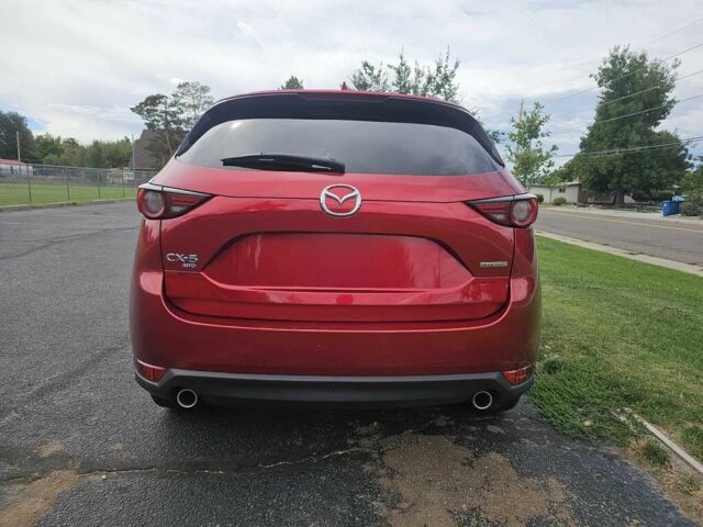 Красный Мазда СХ-5, объемом двигателя 2.5 л и пробегом 50 тыс. км за 18500 $, фото 4 на Automoto.ua