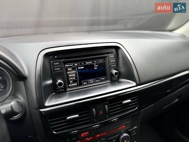 Червоний Мазда СХ-5, об'ємом двигуна 2 л та пробігом 240 тис. км за 10999 $, фото 32 на Automoto.ua
