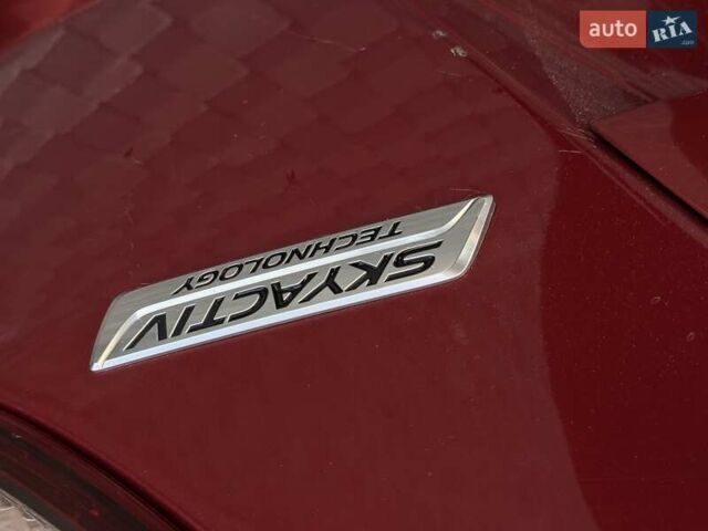 Червоний Мазда СХ-5, об'ємом двигуна 2 л та пробігом 240 тис. км за 10700 $, фото 14 на Automoto.ua