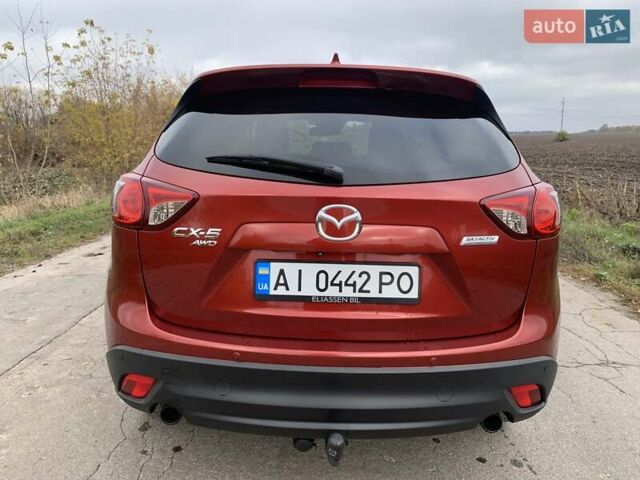 Мазда СХ-5 2012 у Умани на Automoto.ua Червоний Мазда СХ-5, об'ємом двигуна 2.19 л та пробігом 208 тис. км за 13400 $, фото 21 на Automoto.ua