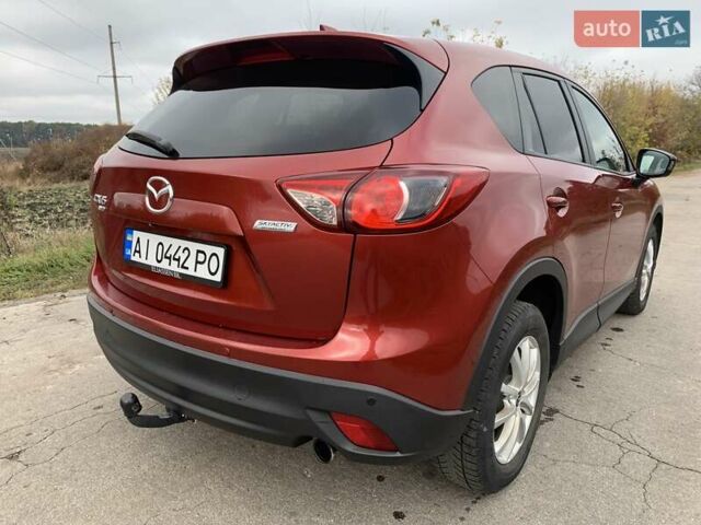 Мазда СХ-5 2012 у Умани на Automoto.ua Червоний Мазда СХ-5, об'ємом двигуна 2.19 л та пробігом 208 тис. км за 13400 $, фото 22 на Automoto.ua