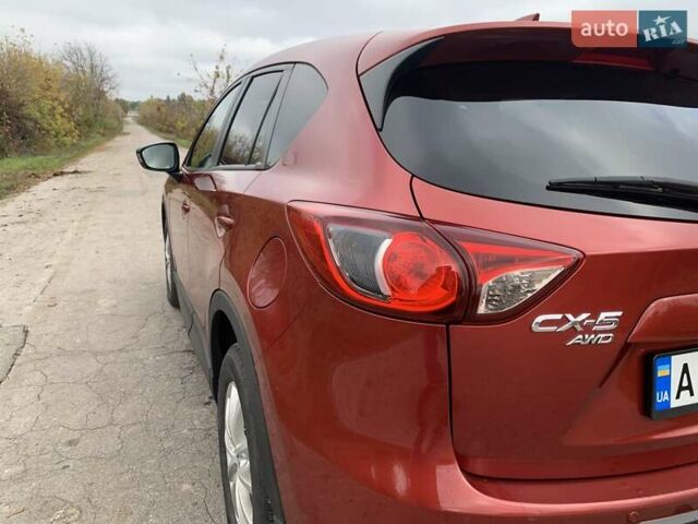 Мазда СХ-5 2012 у Умани на Automoto.ua Червоний Мазда СХ-5, об'ємом двигуна 2.19 л та пробігом 208 тис. км за 13400 $, фото 24 на Automoto.ua