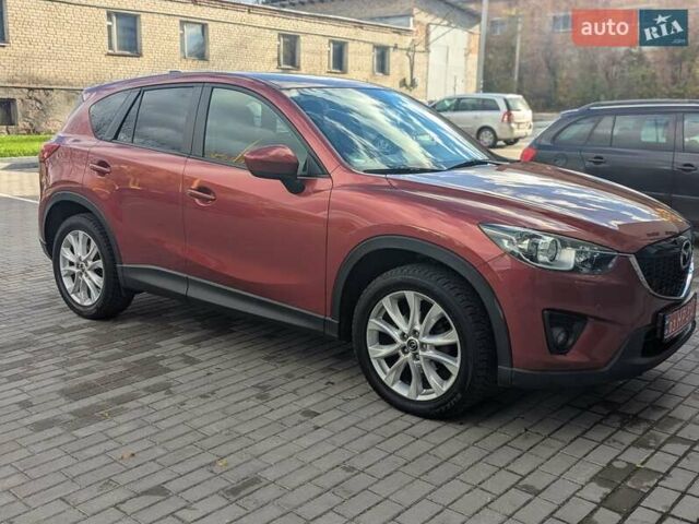Мазда СХ-5 2012 в Дубно на Automoto.ua Красный Мазда СХ-5, объемом двигателя 2.2 л и пробегом 206 тыс. км за 13200 $, фото 7 на Automoto.ua