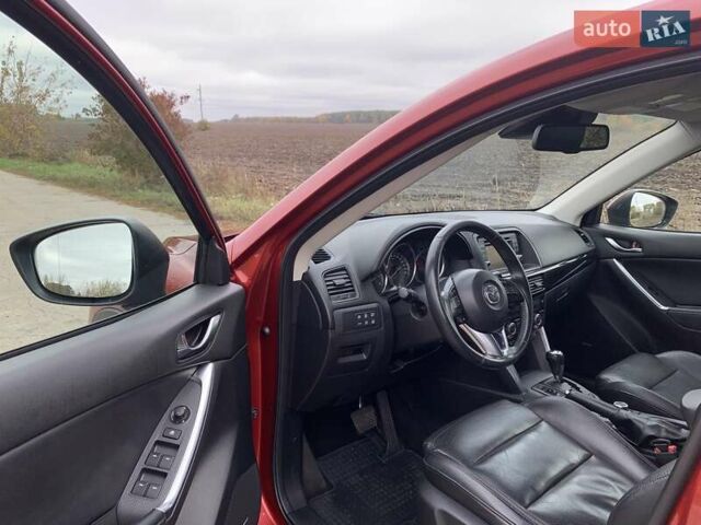 Мазда СХ-5 2012 у Умани на Automoto.ua Червоний Мазда СХ-5, об'ємом двигуна 2.19 л та пробігом 208 тис. км за 13400 $, фото 12 на Automoto.ua