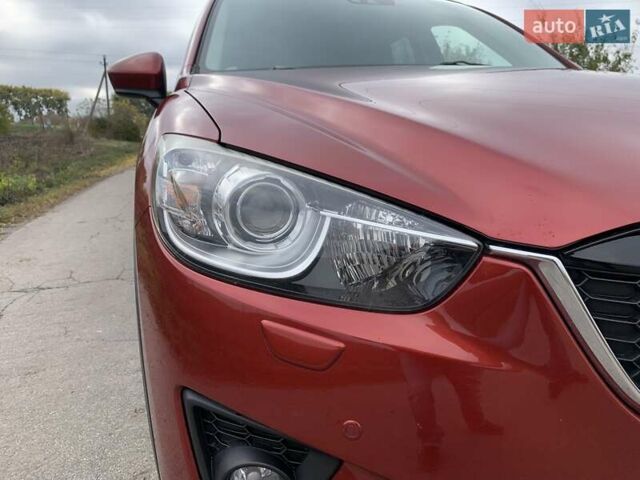 Мазда СХ-5 2012 у Умани на Automoto.ua Червоний Мазда СХ-5, об'ємом двигуна 2.19 л та пробігом 208 тис. км за 13400 $, фото 10 на Automoto.ua