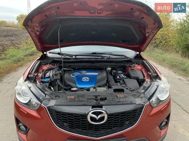 Мазда СХ-5 2012 у Умани на Automoto.ua Червоний Мазда СХ-5, об'ємом двигуна 2.19 л та пробігом 208 тис. км за 13400 $, фото 25 на Automoto.ua