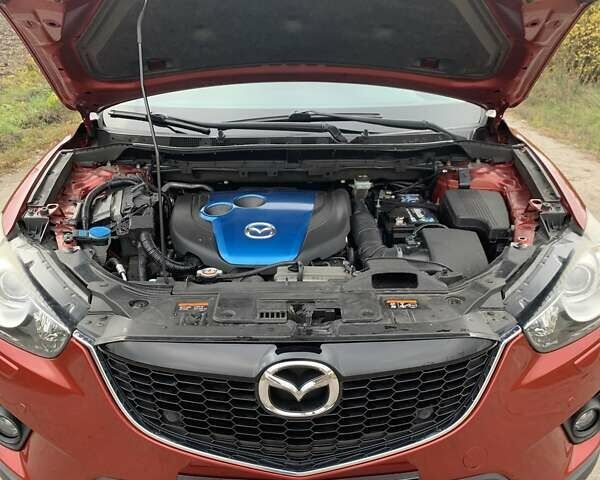 Мазда СХ-5 2012 у Умани на Automoto.ua Червоний Мазда СХ-5, об'ємом двигуна 2.19 л та пробігом 208 тис. км за 13400 $, фото 28 на Automoto.ua