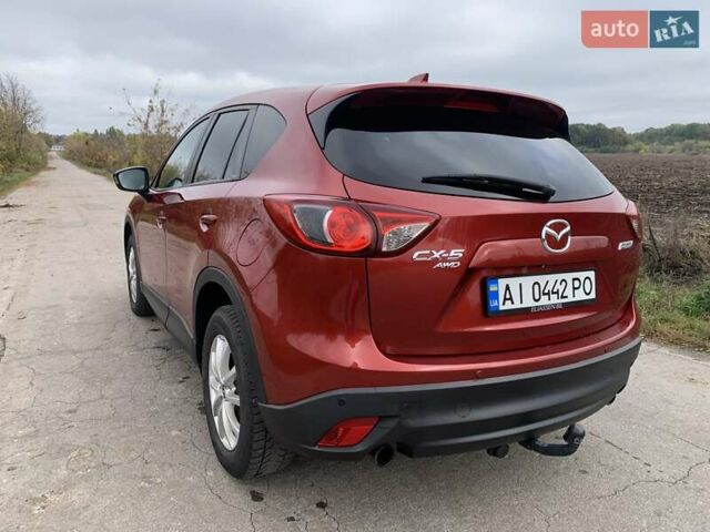 Мазда СХ-5 2012 у Умани на Automoto.ua Червоний Мазда СХ-5, об'ємом двигуна 2.19 л та пробігом 208 тис. км за 13400 $, фото 20 на Automoto.ua