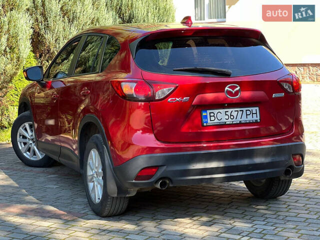 Червоний Мазда СХ-5, об'ємом двигуна 2 л та пробігом 160 тис. км за 10999 $, фото 6 на Automoto.ua