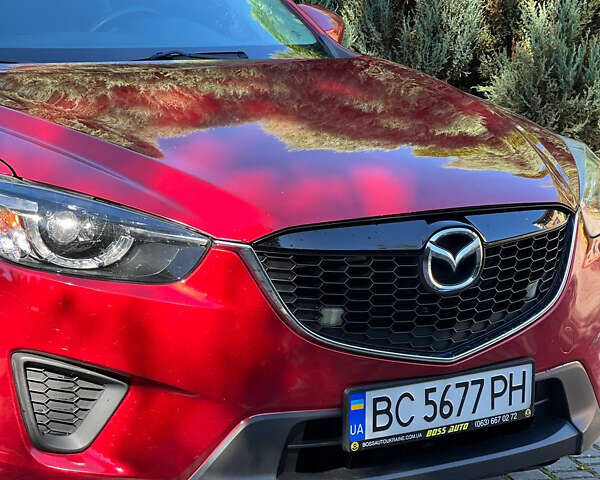 Червоний Мазда СХ-5, об'ємом двигуна 2 л та пробігом 160 тис. км за 10999 $, фото 4 на Automoto.ua