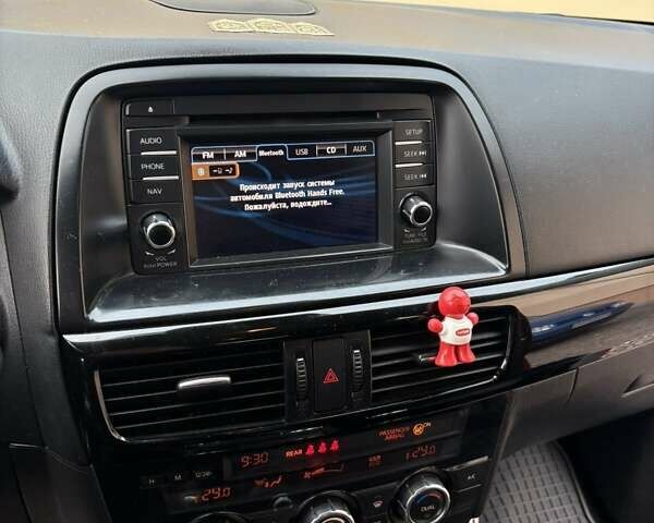 Красный Мазда СХ-5, объемом двигателя 2.19 л и пробегом 214 тыс. км за 13000 $, фото 1 на Automoto.ua