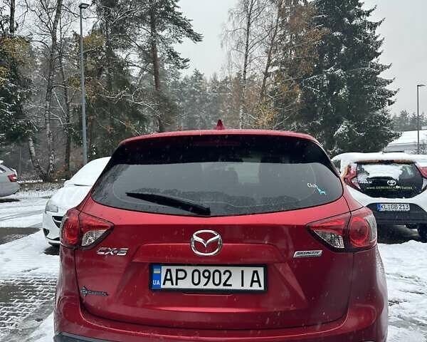 Червоний Мазда СХ-5, об'ємом двигуна 2 л та пробігом 211 тис. км за 13000 $, фото 2 на Automoto.ua