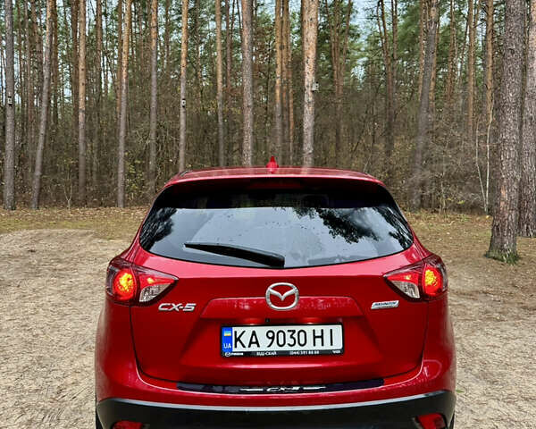 Червоний Мазда СХ-5, об'ємом двигуна 2 л та пробігом 150 тис. км за 15450 $, фото 1 на Automoto.ua