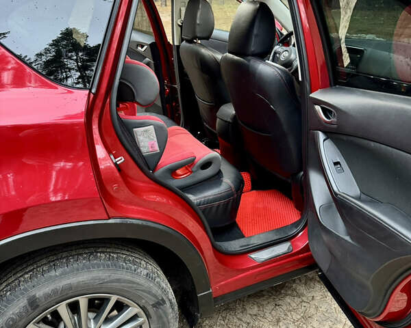 Червоний Мазда СХ-5, об'ємом двигуна 2 л та пробігом 150 тис. км за 15450 $, фото 10 на Automoto.ua