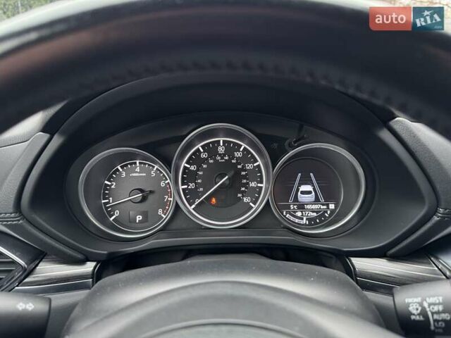 Красный Мазда СХ-5, объемом двигателя 2.49 л и пробегом 165 тыс. км за 18400 $, фото 30 на Automoto.ua