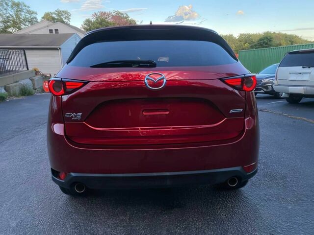 Красный Мазда СХ-5, объемом двигателя 2.5 л и пробегом 58 тыс. км за 14500 $, фото 4 на Automoto.ua