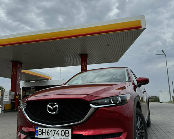 Красный Мазда СХ-5, объемом двигателя 2.49 л и пробегом 53 тыс. км за 21000 $, фото 2 на Automoto.ua