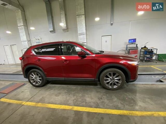 Красный Мазда СХ-5, объемом двигателя 2.49 л и пробегом 201 тыс. км за 20500 $, фото 4 на Automoto.ua