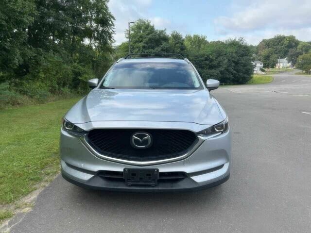 Серый Мазда СХ-5, объемом двигателя 2.5 л и пробегом 40 тыс. км за 7500 $, фото 1 на Automoto.ua