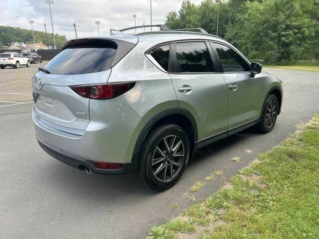 Серый Мазда СХ-5, объемом двигателя 2.5 л и пробегом 40 тыс. км за 7500 $, фото 6 на Automoto.ua