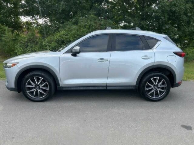 Серый Мазда СХ-5, объемом двигателя 2.5 л и пробегом 40 тыс. км за 7500 $, фото 3 на Automoto.ua