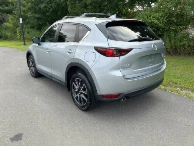 Серый Мазда СХ-5, объемом двигателя 2.5 л и пробегом 40 тыс. км за 7500 $, фото 4 на Automoto.ua