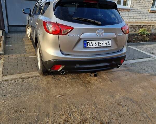 Серый Мазда СХ-5, объемом двигателя 2 л и пробегом 300 тыс. км за 12000 $, фото 1 на Automoto.ua