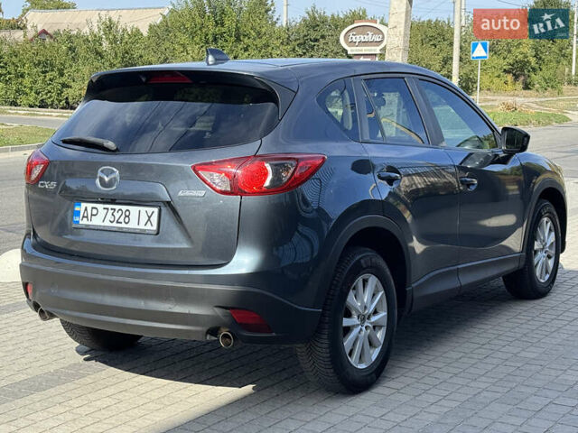 Сірий Мазда СХ-5, об'ємом двигуна 2 л та пробігом 190 тис. км за 11300 $, фото 4 на Automoto.ua