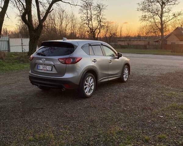 Серый Мазда СХ-5, объемом двигателя 2.2 л и пробегом 212 тыс. км за 13500 $, фото 4 на Automoto.ua