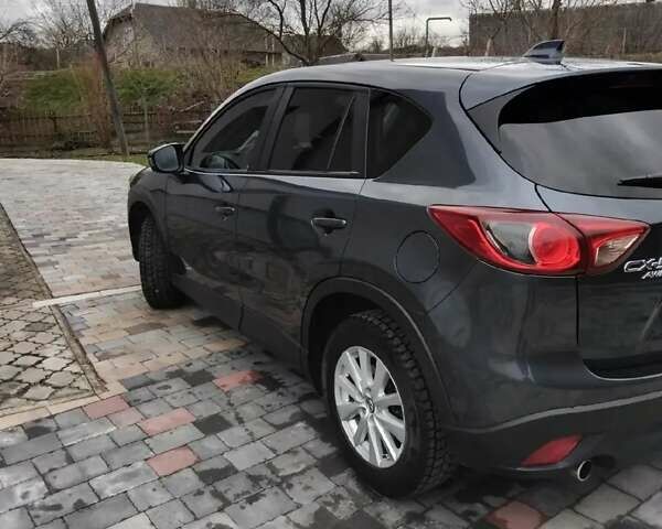 Серый Мазда СХ-5, объемом двигателя 2.19 л и пробегом 259 тыс. км за 12700 $, фото 1 на Automoto.ua