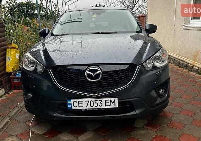 Серый Мазда СХ-5, объемом двигателя 2.19 л и пробегом 225 тыс. км за 13500 $, фото 1 на Automoto.ua