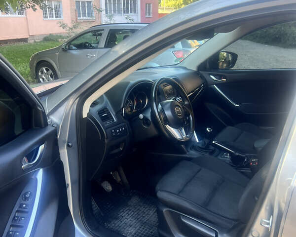 Серый Мазда СХ-5, объемом двигателя 2.19 л и пробегом 302 тыс. км за 11400 $, фото 11 на Automoto.ua