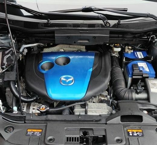 Серый Мазда СХ-5, объемом двигателя 2.2 л и пробегом 175 тыс. км за 13000 $, фото 2 на Automoto.ua