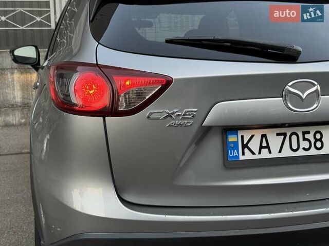 Серый Мазда СХ-5, объемом двигателя 2 л и пробегом 330 тыс. км за 9500 $, фото 6 на Automoto.ua