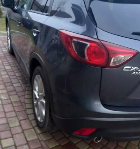 Серый Мазда СХ-5, объемом двигателя 2.19 л и пробегом 225 тыс. км за 14300 $, фото 2 на Automoto.ua