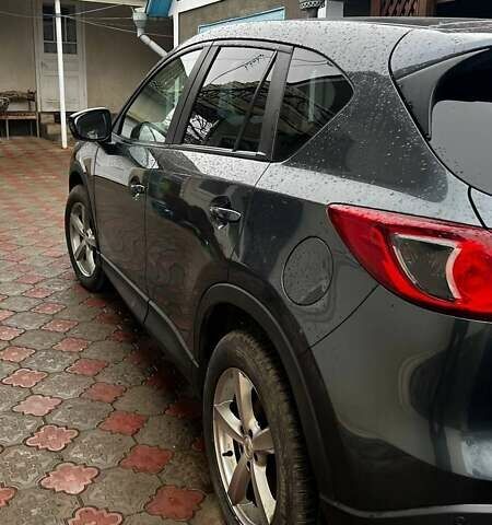 Серый Мазда СХ-5, объемом двигателя 2.19 л и пробегом 225 тыс. км за 13500 $, фото 2 на Automoto.ua