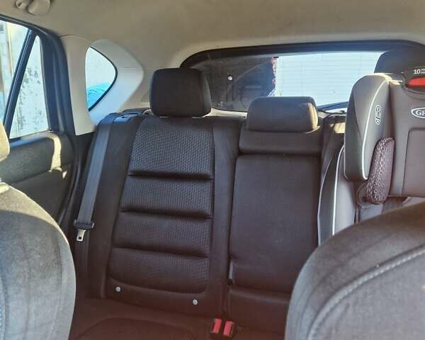 Серый Мазда СХ-5, объемом двигателя 2 л и пробегом 300 тыс. км за 12000 $, фото 11 на Automoto.ua