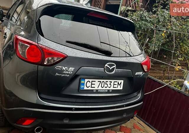 Серый Мазда СХ-5, объемом двигателя 2.19 л и пробегом 225 тыс. км за 13500 $, фото 3 на Automoto.ua